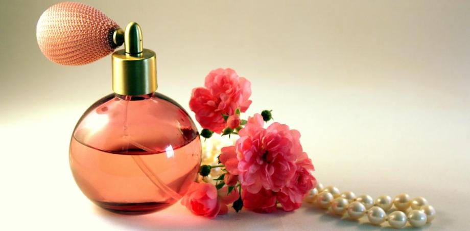 perfume with a strand of pearls